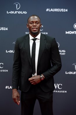 El exatleta Usain Bolt posa durante la alfombra roja de la 25ª edición de los Premios Laureus 2024, en la Galería de Cristal, a 22 de abril de 2024, en Madrid (España). El Palacio de Cibeles de Madrid acoge la gala de la 25 edición de los Premios Laureus 