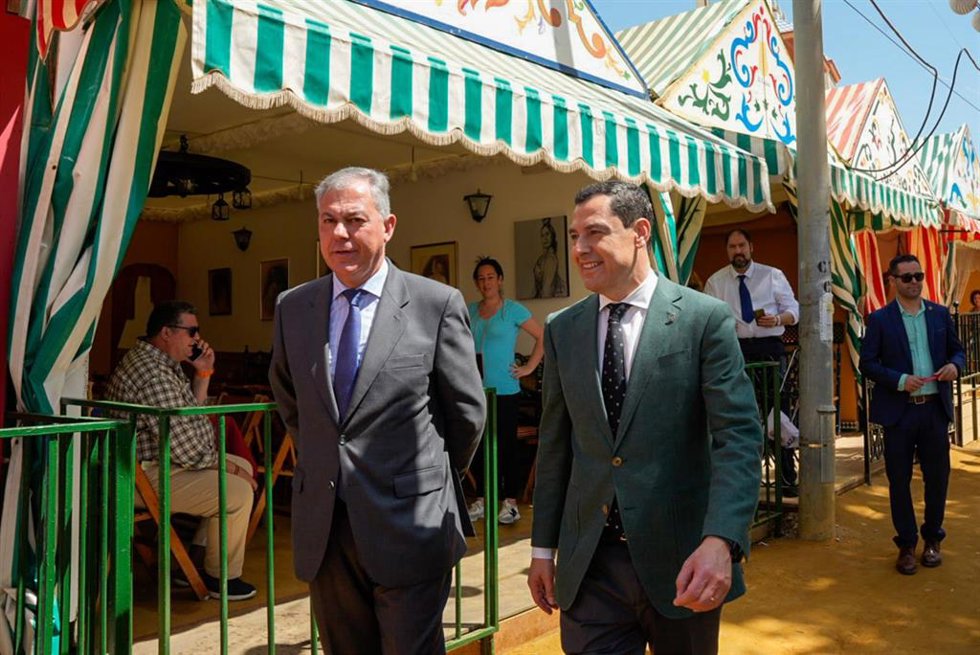 Sanz con Juanma Moreno en la Feria