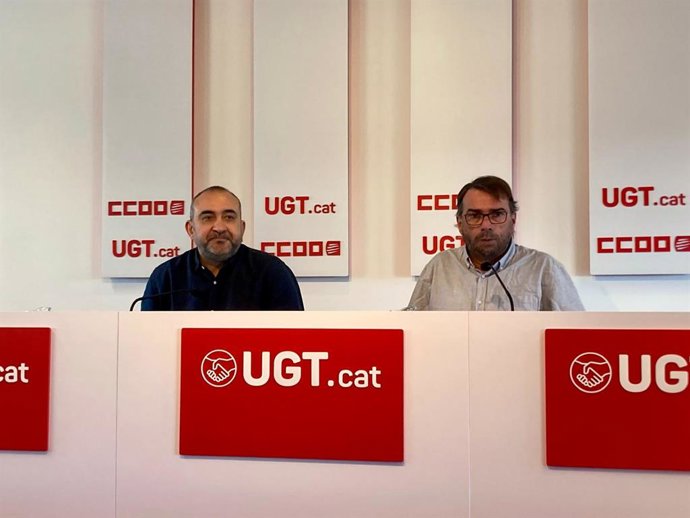 El secretario general de UGT de Catalunya, Camil Ros, y el secretario general de CC.OO. De Catalunya, Javier Pacheco, en rueda de prensa