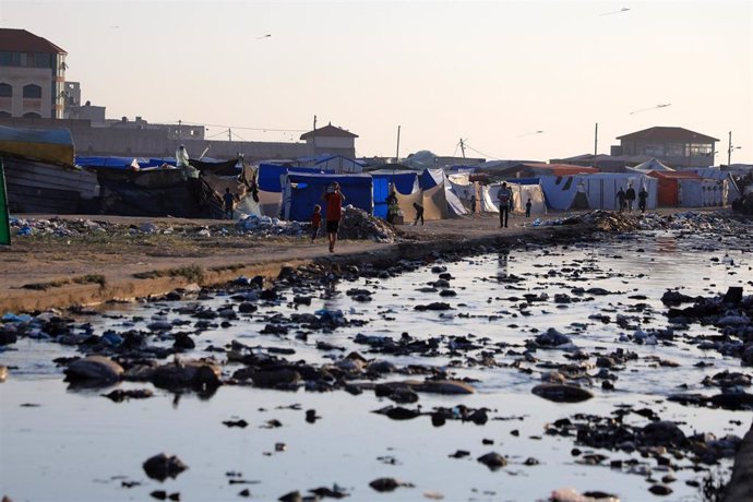 DEIR AL-BALAH, April 18, 2024  -- Sewage water is seen at a temporary camp in central Gaza Strip city of Deir al-Balah, April 17, 2024.