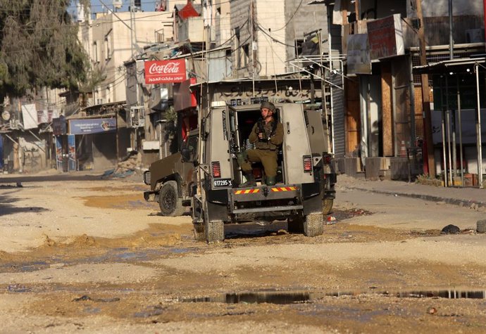TULKARM, April 19, 2024  -- A soldier is seen during an Israeli raid in the Nour Shams Palestinian refugee camp, east of the city of Tulkarm in the West Bank, on April 19, 2024. A Palestinian was killed by the Israeli army in the Nour Shams Palestinian re