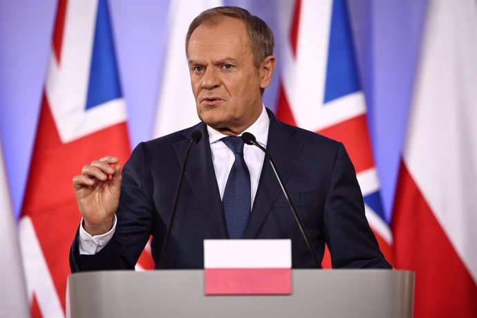 22 April 2024, Poland, Warsaw: Polish Prime Minister Donald Tusk addresses a press conference with his British counterpart following bilateral talks at the Prime Minister's office in Warsaw. Photo: Henry Nicholls/PA Wire/dpa