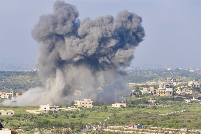 MAJDAL ZOUN, April 16, 2024  -- Smokes caused by Israeli strikes are pictured in Majdal Zoun, Lebanon, on April 15, 2024. Lebanese military sources, who spoke on condition of anonymity, said Israel on Monday carried out nine successive airstrikes on six b