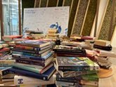 Foto: Empresas.- Empleados de Roche donan más de 350 libros a la Fundación ONCE