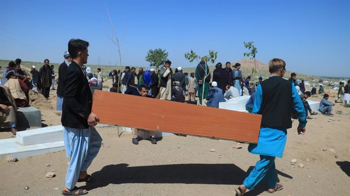 HERAT, April 30, 2024  -- People attend the funeral of victims killed in a shooting at a mosque in the Gozara district, west Afghanistan's Herat Province, on April 30, 2024. Six people were shot dead and another was injured following an attack at a mosque