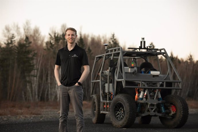 Potential CEO Sam Poirier with the company's P0 test vehicle, an all-electric, quad-motor, 550hp off-road technology testbed with an array of sensors (including cameras and lidar) to mirror any customer configuration. P0 is used to develop and refine Pote