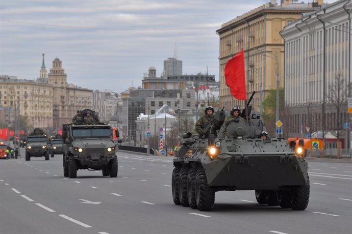 MOSCOW, May 2, 2024  -- Russian military vehicles drive along a street to attend a rehearsal for the Victory Day military parade in Moscow, Russia, on May 2, 2024.