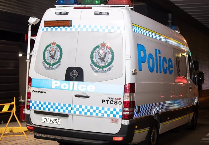 SYDNEY, April 13, 2024  -- A police vehicle is seen outside a shopping center after a knife attack in Sydney, Australia, April 13, 2024. Six people were killed in a knife attack at a shopping center in Australia's Sydney on Saturday and the attacker was s