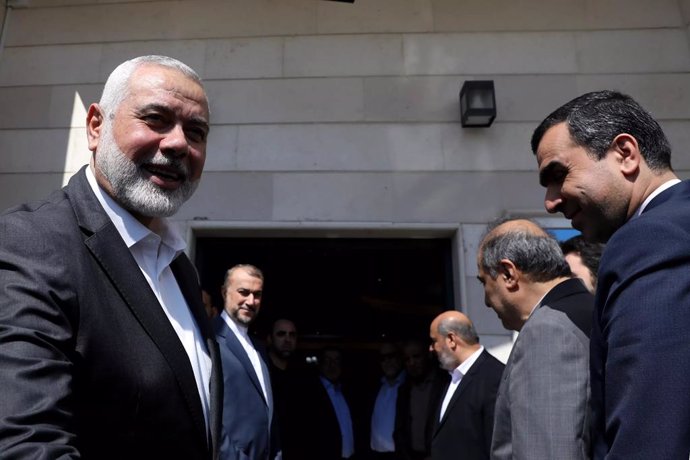 Archivo - February 13, 2024, Doha, Qatar: Hamas political bureau chief ISMAIL HANIYEH (L) preparing to welcome the Iranian Foreign Minister in Doha.