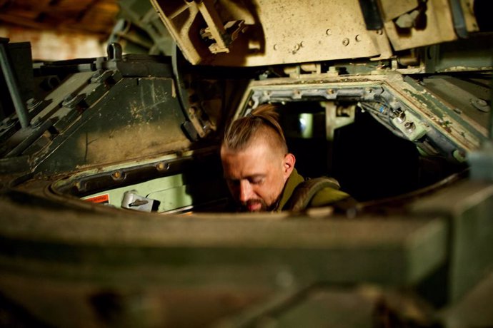 April 21, 2024, Donetsk Region, Ukraine: A Ukrainian soldier inside the Bradly military vehicle, prepares the vehicle for transporting soldiers to the front.