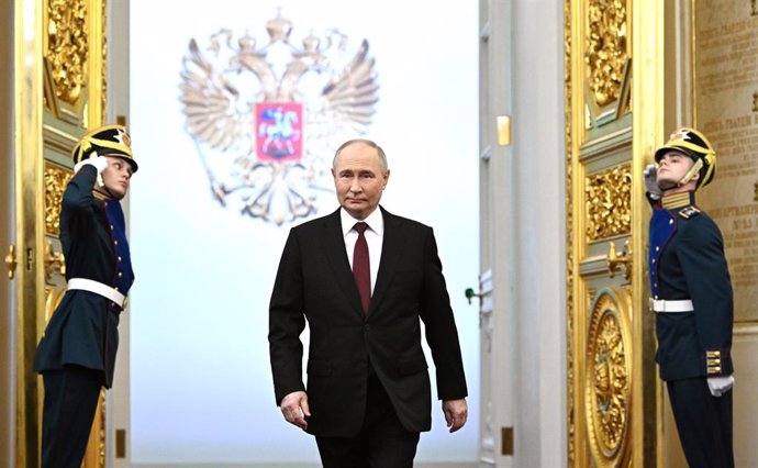 HANDOUT - 07 May 2024, Russia, Moscow: Russian President Vladimir Putin (C) arrives to attend his inauguration ceremony as President of the Russian Federation in the Kremlin. Photo: -/Kremlin/dpa - ATTENTION: editorial use only and only if the credit ment