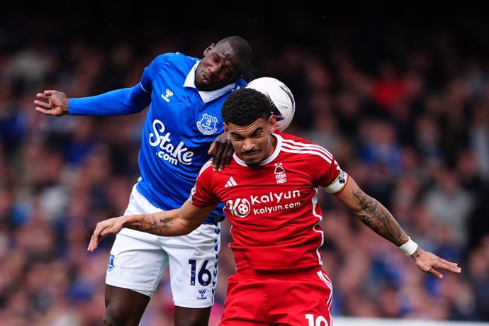 21 April 2024, United Kingdom, Liverpool: Everton's Abdoulaye Doucoure in action against Nottingham Forest's Morgan Gibbs-White during the English Premier League soccer match Everton and Nottingham Forest at Goodison Park. Photo: Peter Byrne/PA Wire/dpa