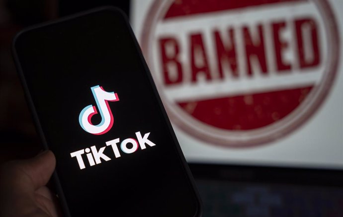 April 25, 2024: In this photo illustration, logo of Tiktok is displayed on mobile phone screen next to ban sign, in Guwahati, India 25 April 2024.  US President Joe Biden signs law to ban Chinese-owned TikTok unless sold to US company.