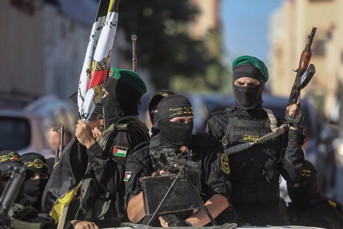 Archivo - 05 August 2023, Palestinian Territories, Gaza City: Members of the Al-Quds Brigades, the military wing of the Islamic Jihad Movement, take part in an armed military parade to commemorate their fighters who were killed last year during the fighti