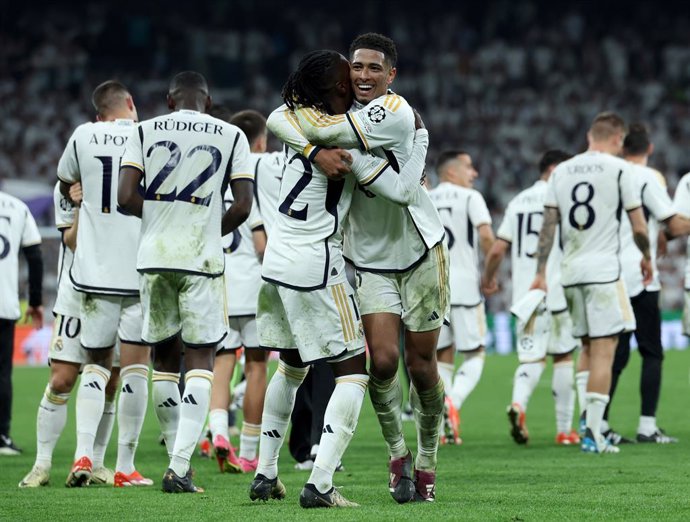 08 May 2024, Spain, Madrid: Real Madrid's Jude Bellingham (R) and Eduardo Camavinga celebrate after the UEFA Champions League semi-final, second leg match between Real Madrid and Bayern Munich at the Santiago Bernabeu. Photo: Isabel Infantes/PA Wire/dpa