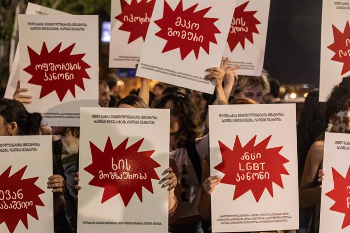 April 28, 2024, Tbilisi, Georgia: Protesters hold placards expressing their opinion during a protest against the reintroduction of a bill on 'foreign agents' in central Tbilisi.