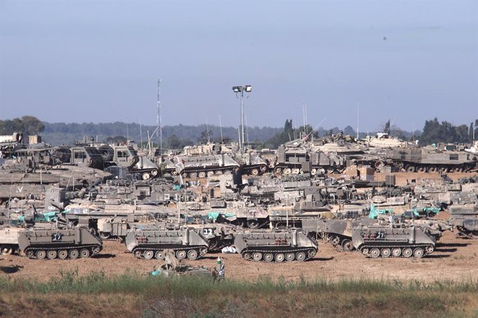 KEREM SHALOM CROSSING, May 8, 2024  -- Israeli armored vehicles are deployed near the Kerem Shalom crossing in southern Israel, on May 8, 2024. Israel's army announced on Wednesday that it was continuing its ground assault on Gaza's Rafah, reporting appro