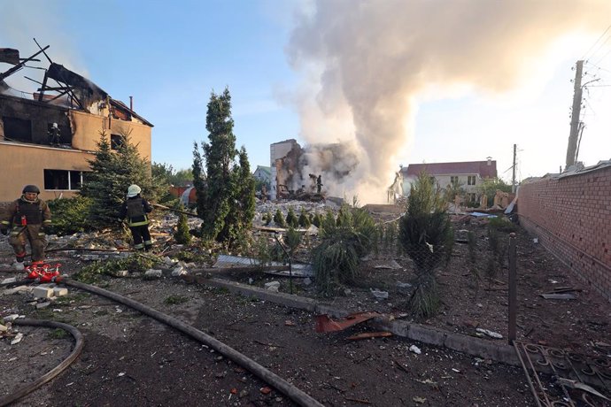 May 10, 2024, Kharkiv, Ukraine: KHARKIV, UKRAINE - MAY 10, 2024 - Rescuers are seen at work at a house after a Russian missile attack, Kharkiv, northeastern Ukraine. On the night of 10 May, Russian invaders attacked Kharkiv with an S-300 missile. A child 