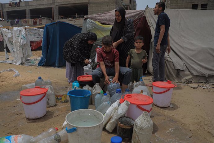 GAZA, May 10, 2024  -- Palestinians are seen at a temporary camp in the southern Gaza Strip city of Rafah, on May 10, 2024. Days after the Israeli army took control of the Rafah crossing, United Nations (UN) agencies on Friday reiterated the severe humani