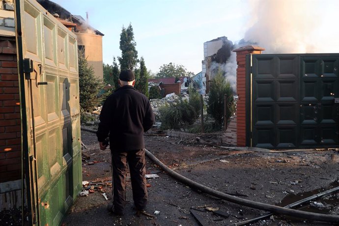 May 10, 2024, Kharkiv, Ukraine: KHARKIV, UKRAINE - MAY 10, 2024 - A senior man looks at damage caused by a Russian missile attack, Kharkiv, northeastern Ukraine. On the night of 10 May, Russian invaders attacked Kharkiv with an S-300 missile. A child aged