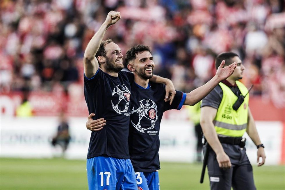 Daley Blind and Ivan Martin of Girona FC celebrate qualification for the Champions League during the Spanish league, La Liga EA Sports, football match played between Girona FC and FC Barcelona at Estadio de Montilivi on May 04, 2024 in Girona, Spain.