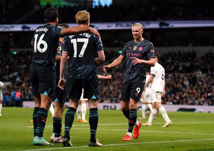 14 May 2024, United Kingdom, London: Manchester City's Erling Haaland (R) celebrates scoring their side's first goal of the game during the English Premier League soccer match between Tottenham Hotspur and Manchester City at the Tottenham Hotspur Stadium.