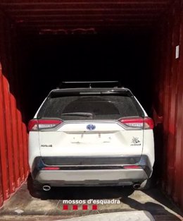Vehicle en un contenidor