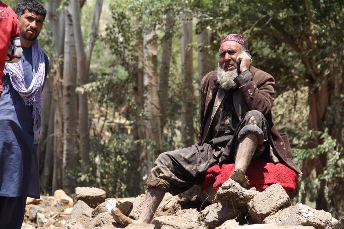 GHOR, May 18, 2024  -- A man affected by flood rests at a safe area in Firoz Koh in west Afghanistan's Ghor province, May 18, 2024. At least 50 people have been killed, with 10 others missing, in the past 24 hours in west Afghanistan's Ghor Province, a lo