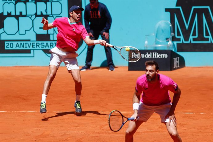Archivo - Marcel Granollers of Spain and Horacio Zeballos of Argentina in action against Pablo Carreno Busta and Pedro Martinez of Spain plays dobles during the Mutua Madrid Open 2022 celebrated at La Caja Magica on May 05, 2022, in Madrid, Spain.
