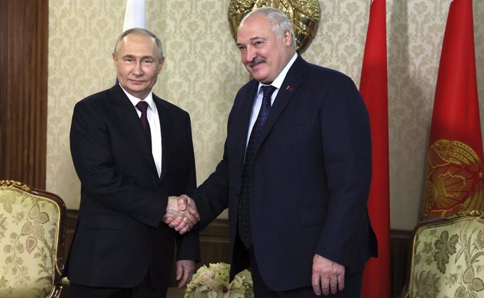 May 23, 2024, Minsk, Belarus: Russian President Vladimir Putin, left, shakes hands with Belarus President Alexander Lukashenko, right, before a bilateral meeting on arrival at Minsk International Airport, May 23, 2024, in Minsk, Belarus.