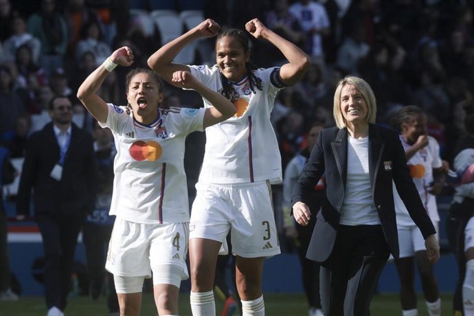 Selma Bacha, Wendie Renard, Coach of Olympique Lyonnais Sonia Bompastor celebrate the victory following the UEFA Women's Champions League, Semi-finals, 2nd leg football match between Paris Saint-Germain and Olympique Lyonnais