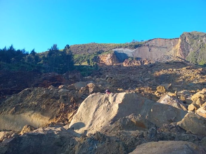 ENGA, May 24, 2024  -- This photo taken with a mobile photo shows a scene near a landslide in Enga province, Papua New Guinea, May 24, 2024. At about 3:00 a.m. local time on Friday, a landslide struck Kaokalam village in Enga province, located over 600 km