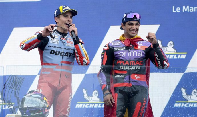 Second place Marc Marquez of Spain #93 and Gresini Racing MotoGP (Ducati), winner Jorge Martin of Spain #89 and Prima Pramac Racing (Ducati) during the podium ceremony following the 2024 MotoGP Michelin Grand Prix de France (27 laps, FrenchGP) on day 3 at