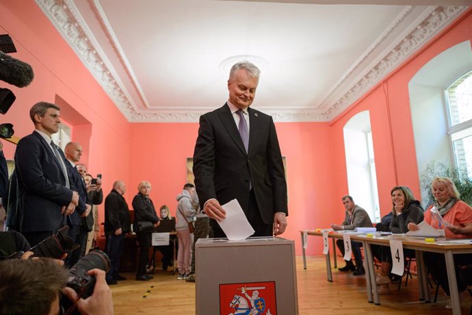 May 12, 2024, Vilnius, Lithuania: Lithuania's President Gitanas Nauseda casts his vote during the first round of Lithuania's presidential election at a polling station in Vilnius. Lithuania's President Gitanas Nauseda voted in the first round of Lithuania