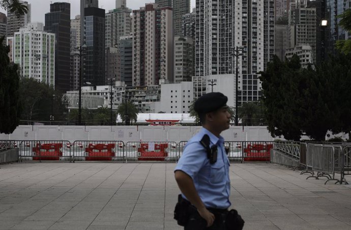 May 31, 2024, Hong Kong, CHINA: In Hong Kong, a policeman patrol in front of main gate to the heavily barricaded Victoria Park, a former venue for annual June 4th Candlelight Vigil. Hong Kong Police is tightening up surveillance around Victoria Park as 35