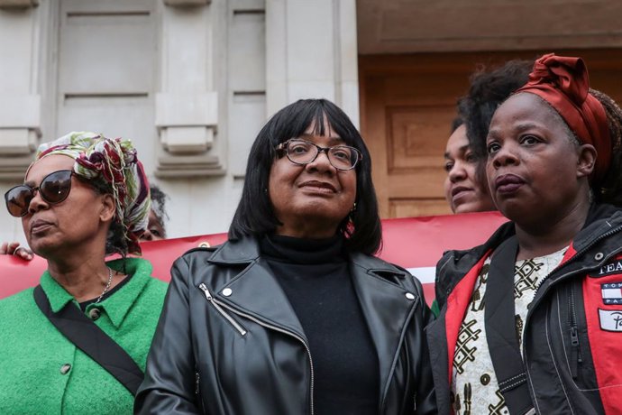 May 29, 2024, London, United Kingdom: Diane Abbott (C) is escorted by Ngozi Fulani (R) from Sistah Space during the demonstration outside Hackney Town Hall. Diane Abbott, MP for Hackney North and Stoke Newington has the Labour whip restored, and supporter