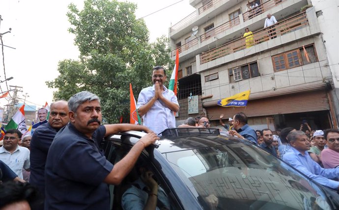 May 15, 2024, New Delhi, New Delhi, India: Delhi Chief Minister and Aam Adami party (AAP) chief  Arvind Kejriwal waves to the party supporters during a road show as part of the election campaign for the lok sabha general election 2024, in New Delhi.