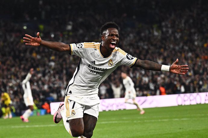 01 June 2024, United Kingdom, London: Madrid's Vinicius Junior celebrates after scoring his side's second goal during the UEFA Champions League final soccer match between Borussia Dortmund and Real Madrid CF at Wembley Stadium. Photo: Tom Weller/dpa