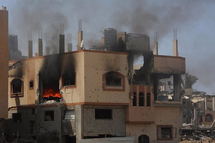 GAZA, June 9, 2024  -- This photo taken on June 8, 2024 shows buildings damaged during Israeli attacks in the Nuseirat refugee camp in the central Gaza Strip. Israeli forces on Saturday rescued four hostages from the Nuseirat refugee camp in the central G