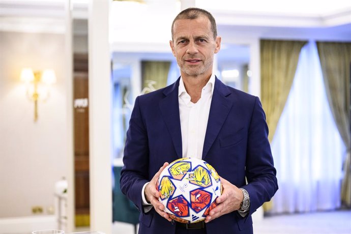 FILED - 31 May 2024, United Kingdom, London: UEFA President Aleksander Ceferin holds a ball in his hand for a photo after an interview with the German Press Agency. Photo: Tom Weller/dpa