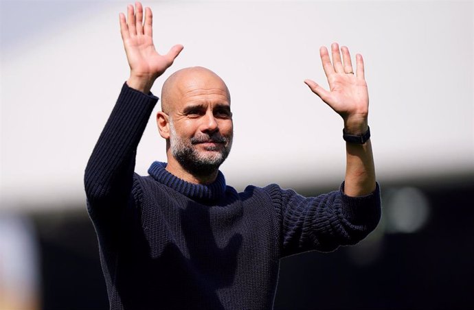 11 May 2024, United Kingdom, London: Manchester City manager Pep Guardiola celebrates after the English Premier League soccer match between Fulham and Manchester City at Craven Cottage, London. Photo: Zac Goodwin/PA Wire/dpa