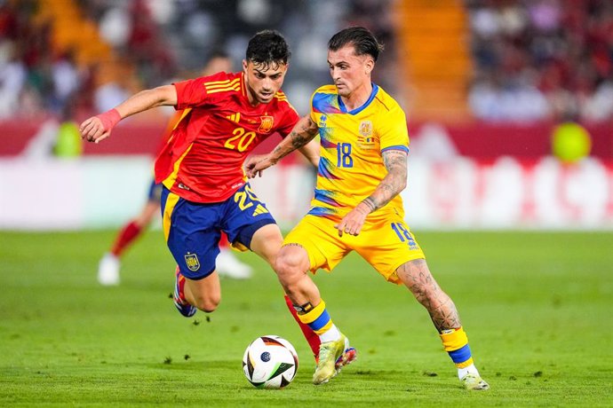 Pedri Gonzalez of Spain and Jesus Rubio of Andorra in action during International Friendly football match played between Spain and Andorra at Nuevo Viveros stadium on June 5, 2024, in Badajoz, Spain.