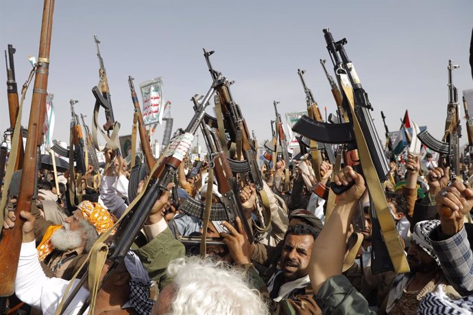 May 31, 2024, Sanaa, Sanaa, Yemen: Houthi supporters hold up weapons during a protest against the US and Israel, and in solidarity with the Palestinian people..Houthi military spokesman Yahya Sarea reported that airstrikes conducted by the United States a