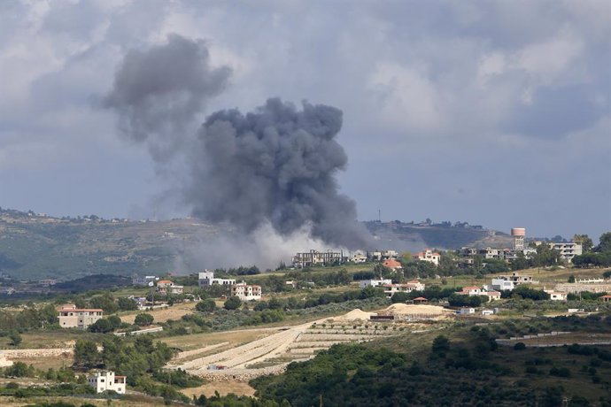 CHAMA, May 26, 2024  -- The smoke caused by an Israeli strike is seen in Jebbayn, Lebanon, May 25, 2024.   Two Hezbollah members were killed and three civilians were injured on Saturday in an Israeli airstrike on a house in Lebanon's village of Aitaroun, 