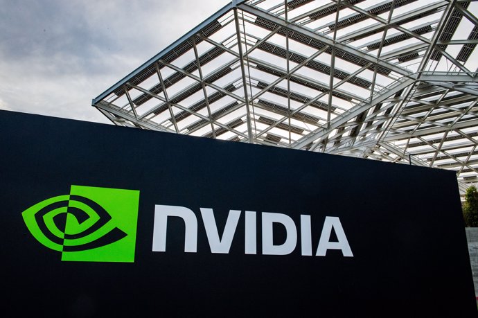 FILED - 23 February 2024, US, Santa Clara: The logo of the chip company Nvidia can be seen at its headquarters in Silicon Valley. Nvidia surpassed the $2 trillion market cap on Friday, becoming the third US company to do so. Photo: Andrej Sokolow/dpa