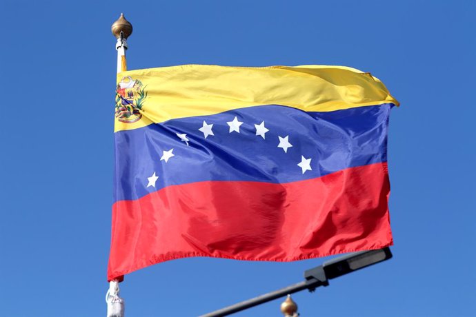 June 9, 2024, Saint Petersburg, Russia: The flag of the Bolivarian Republic of Venezuela seen in the gallery of flags of the participating countries in the framework of St. Petersburg International Economic Forum 2024