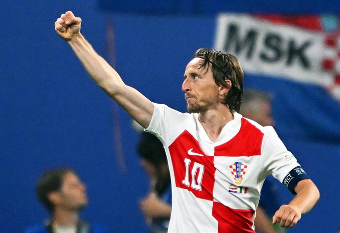 24 June 2024, Saxony, Leipzig: Croatia's Luka Modric celebrates scoring his side's first goal during the UEFA Euro 2024 group B soccer match between Croatia and Italy at Leipzig Arena. Photo: Robert Michael/dpa