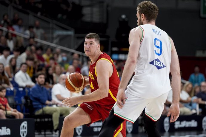 Joel Parra of Spain and Nicolo Melli of Italy in action during the friendy international basketball match played between Spain and Italy at Wizink Center pavilion on June 25, 2024, in Madrid, Spain.