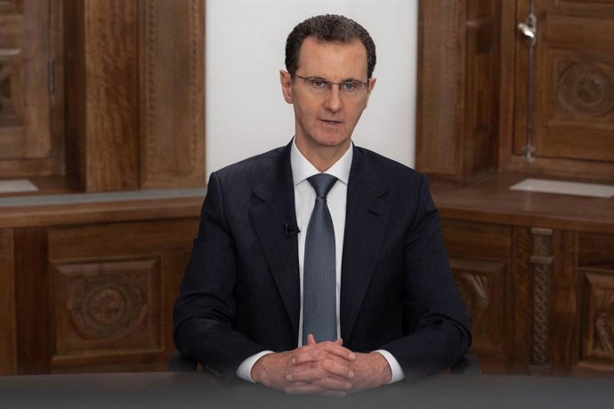 Archivo - El presidente de Siria, Bashar al Assad, durante un discurso televisado desde la capital, Damasco (archivo)