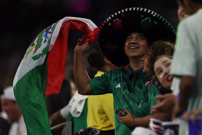 22 June 2024, US, Houston: Supporter of Mexico cheer in the stands during the the CONMEBOL Copa America 2024 Group B soccer match between Mexico and Jamaica at NRG Stadium. 